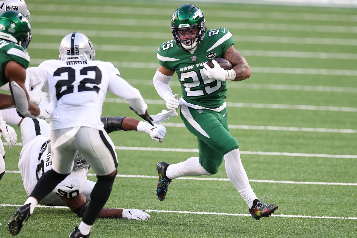 Ty Johnson #25 of the New York Jets in action against the Las Vegas Raiders during their game at MetLife Stadium on December 06, 2020 in East Rutherford, New Jersey.