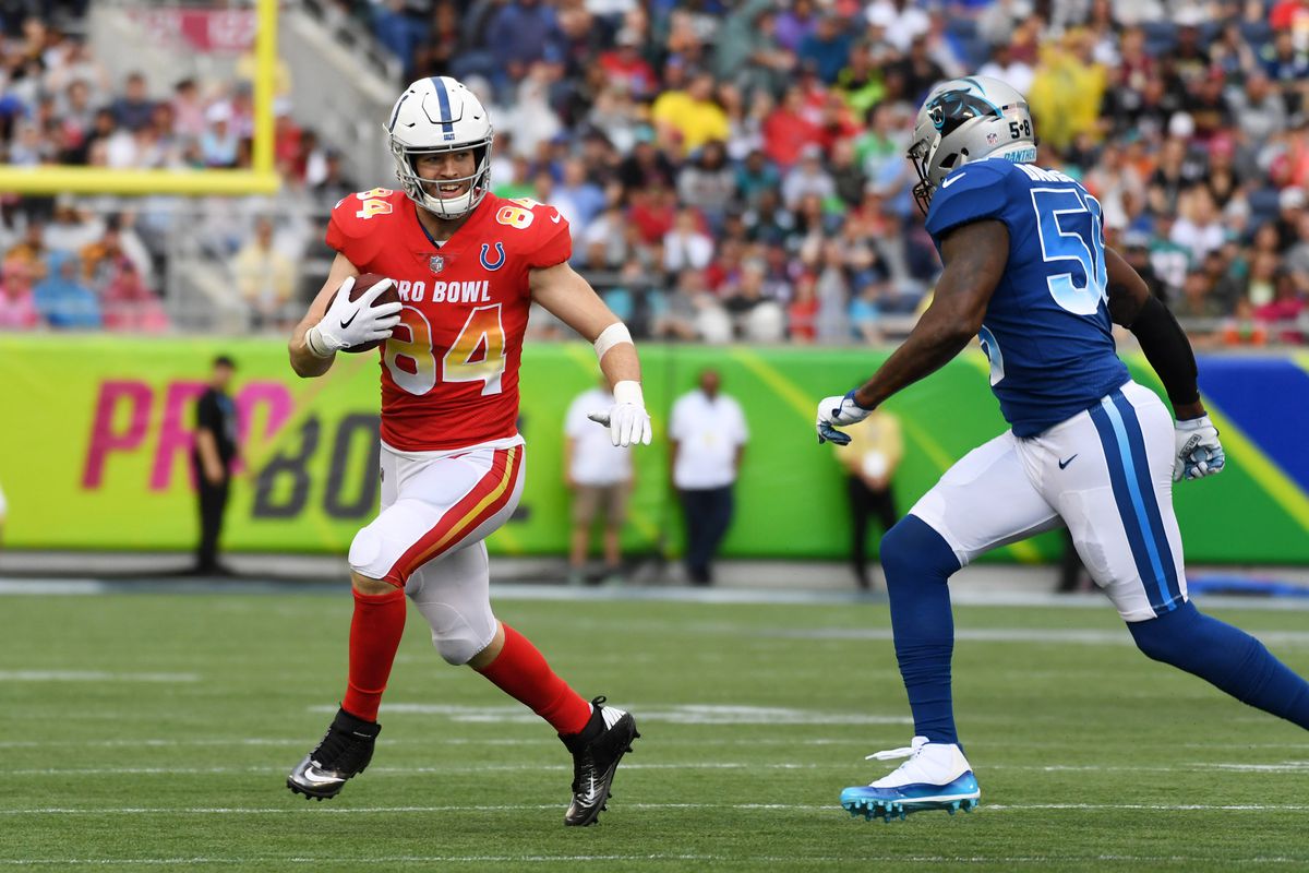 AFC tight end Jack Doyle of the Indianapolis Colts is pursued by NFC linebacker Thomas Davis in the 2018 NFL Pro Bowl at Camping World Stadium.