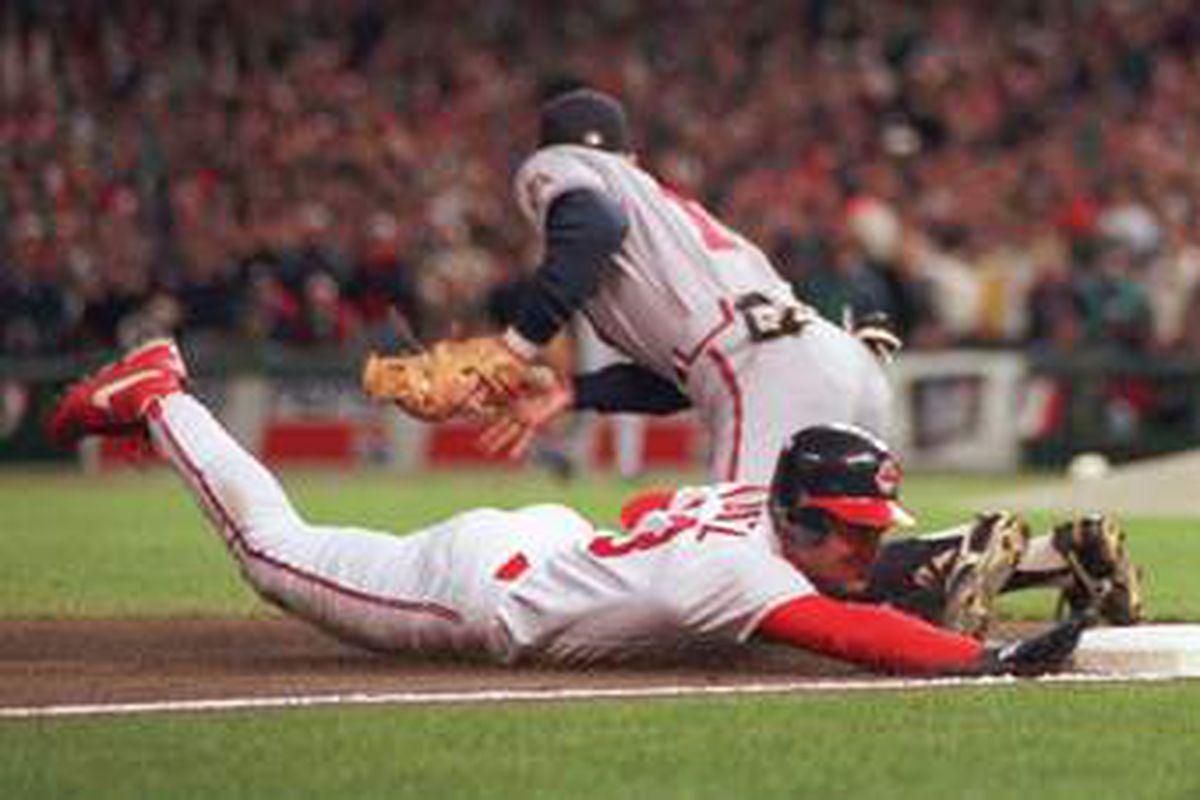 Omar Vizquel is safe at third on an RBI triple in the bottom of the first.