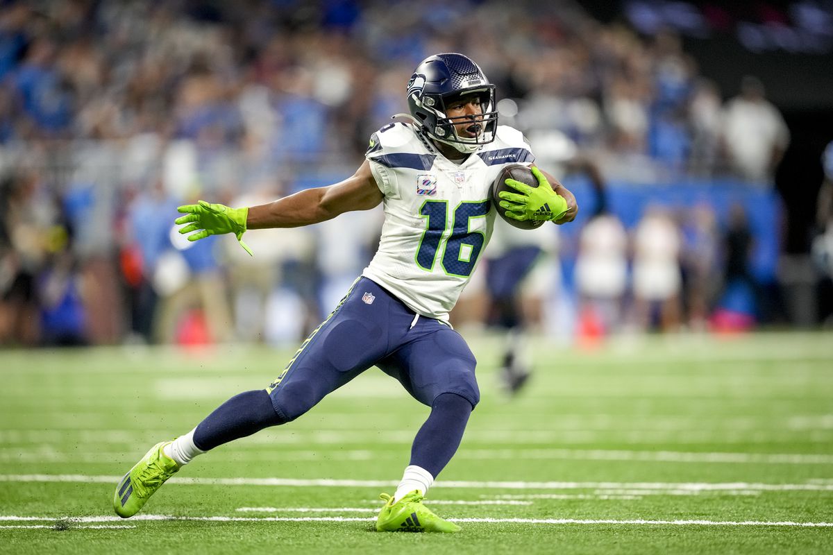 &nbsp;Tyler Lockett #16 of the Seattle Seahawks runs the ball against the Detroit Lions at Ford Field on October 2, 2022 in Detroit, Michigan.
