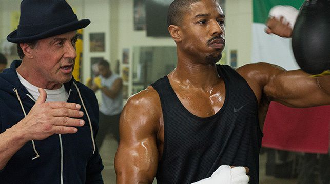 (L-R) Sylvester Stallone and Michael B. Jordan as Rocky Balboa and Adonis Creed in Creed.