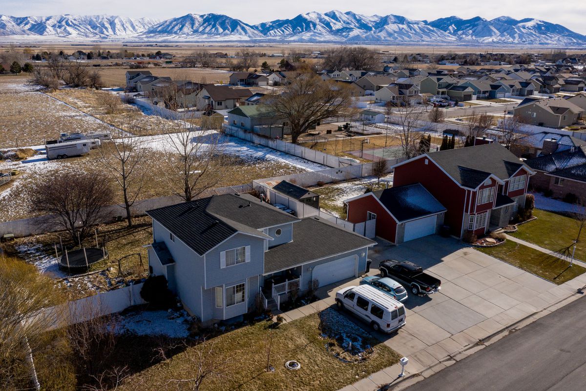 A home on Eastmoor Drive in Grantsville is pictured on Saturday, Jan. 18, 2020, the morning after four people, including three children, were killed and another wounded in a shooting.