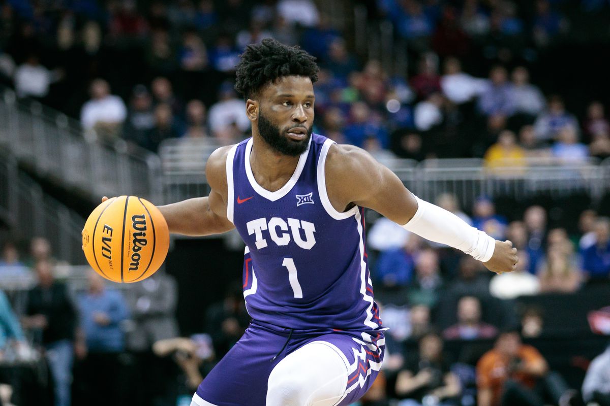 TCU Horned Frogs guard Mike Miles Jr. (1) brings the ball up court during the second half against the Texas Longhorns at T-Mobile Center.