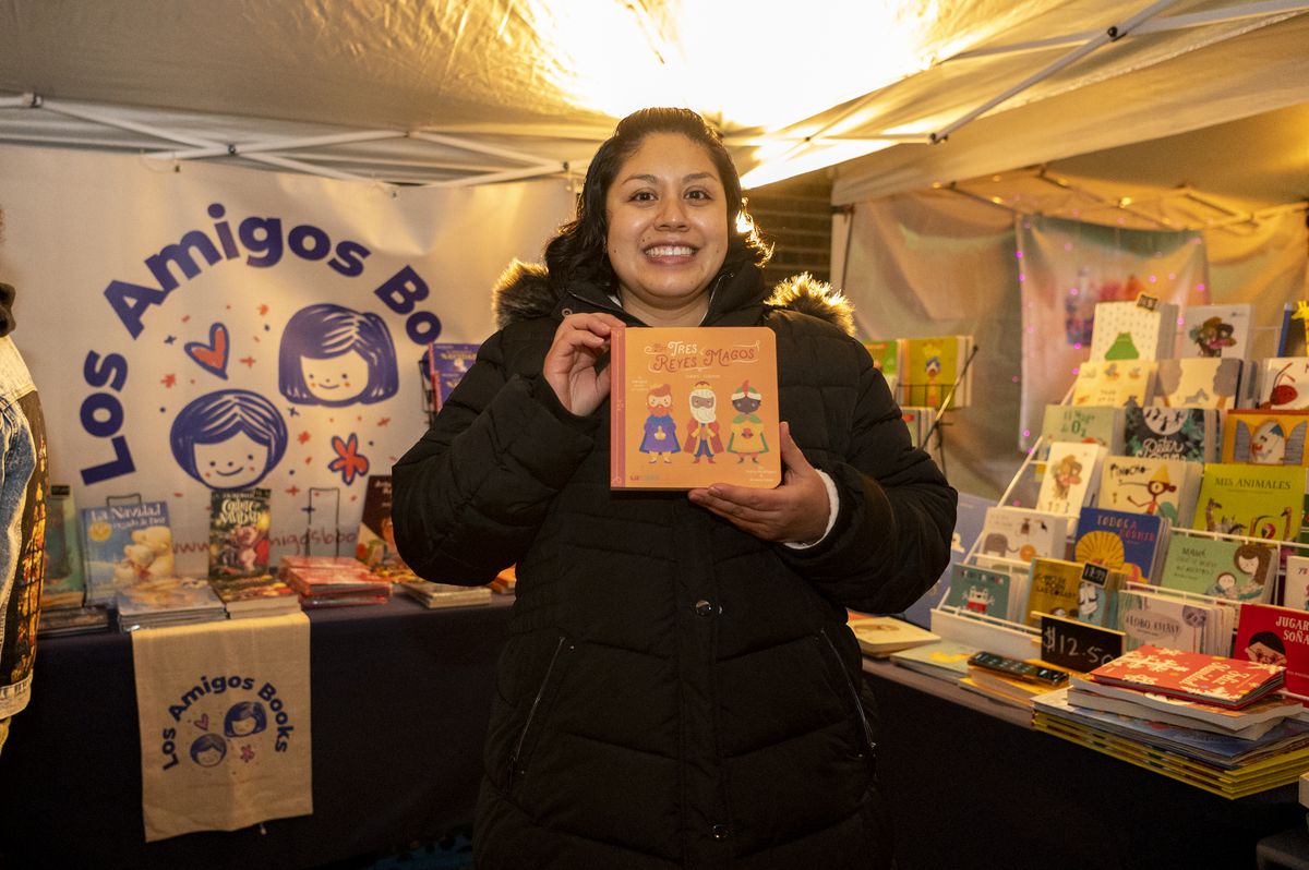 Laura Rodriguez-Romani, owner of Los Amigos Books, was among the vendors Friday night, Dec. 3, 2021 at Destinos al Aire at the Humboldt Park boathouse.