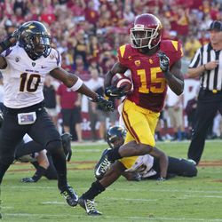 Nelson Agholor avoids a tackler.