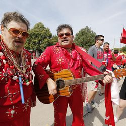 Ron and  Jerry Brew sing prior to the BYU and Nebraska football game in Lincoln, NE Saturday, Sept. 5, 2015. 
