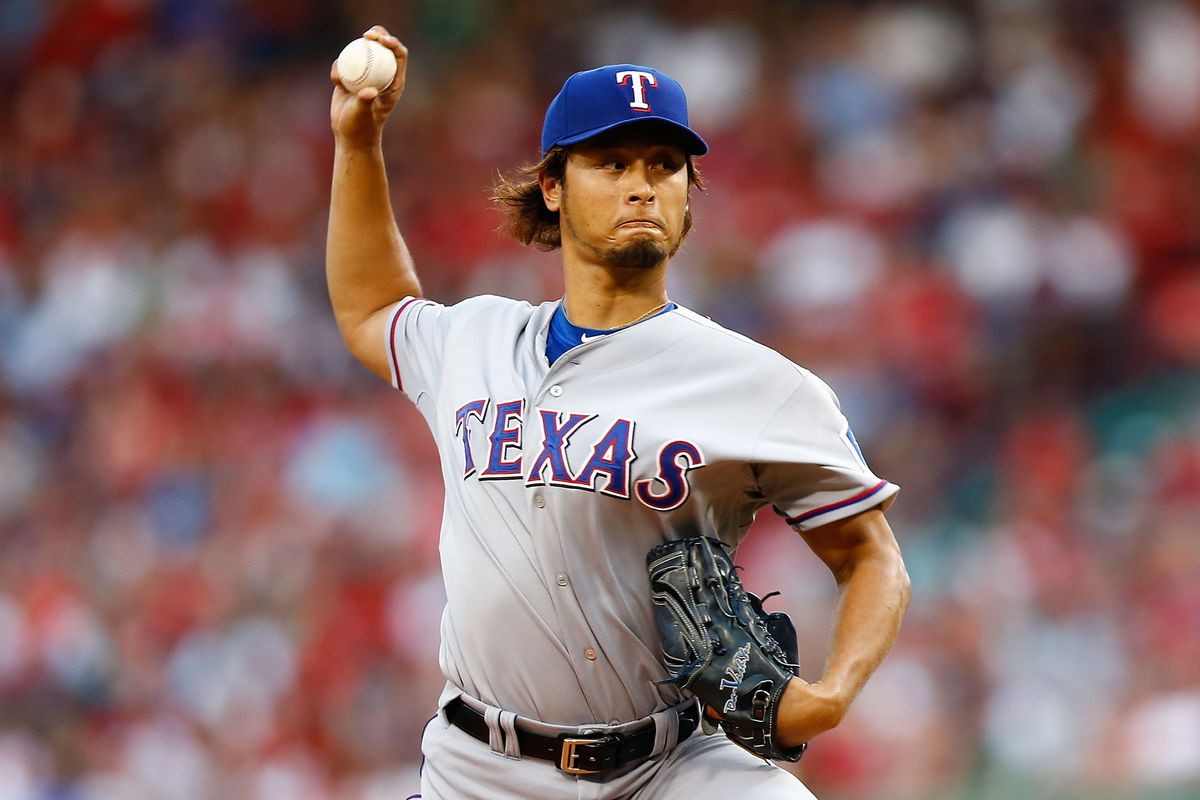 BOSTON, MA - AUGUST 06:  Yu Darvish #11 of the Texas Rangers pitches against the Boston Red Sox during the game on August 6, 2012 at Fenway Park in Boston, Massachusetts.  (Photo by Jared Wickerham/Getty Images)