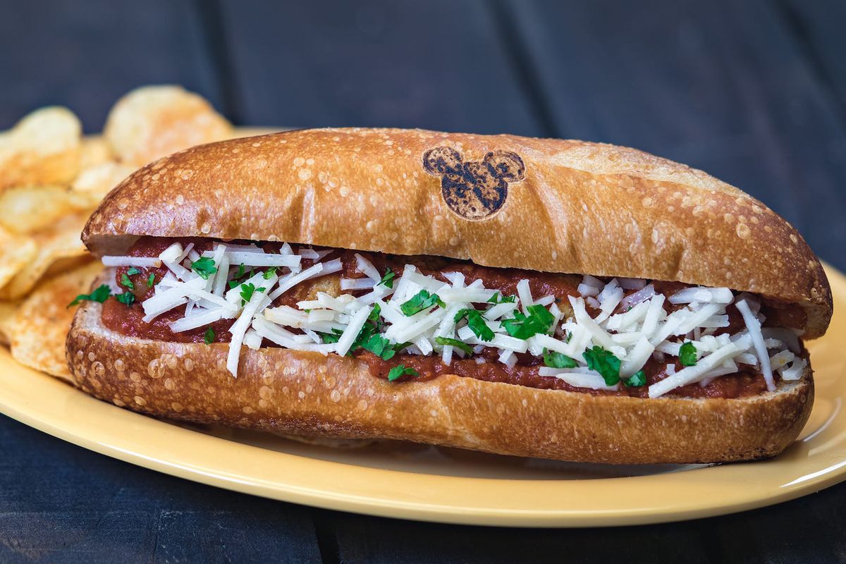 A meatball sub made with Impossible Meat, stamped with a mickey mouse head