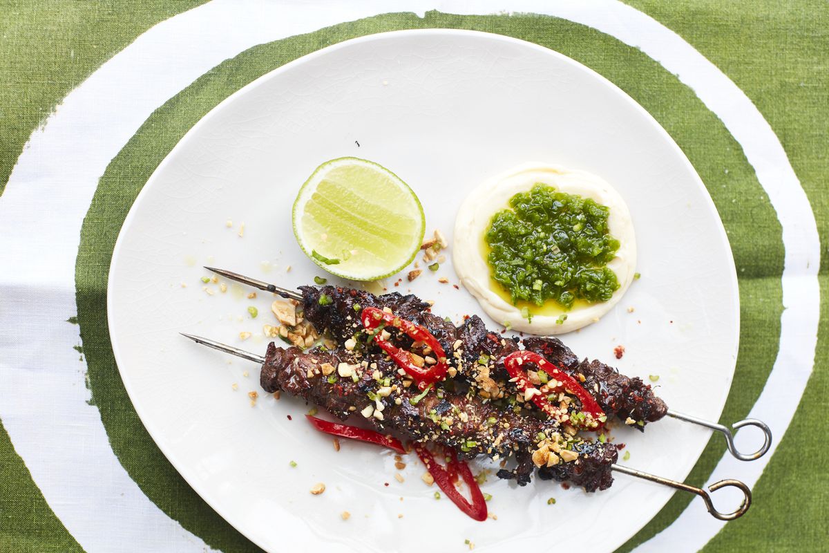 A plate of onglet skewers with chilli, lime and green sauce at Yottam Ottolenghi’s new London restaurant, Rovi, in Fitzrovia