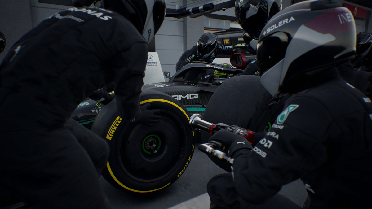 Close-up footage of Mercedes pit crew changing tires in F1 Manager 2023