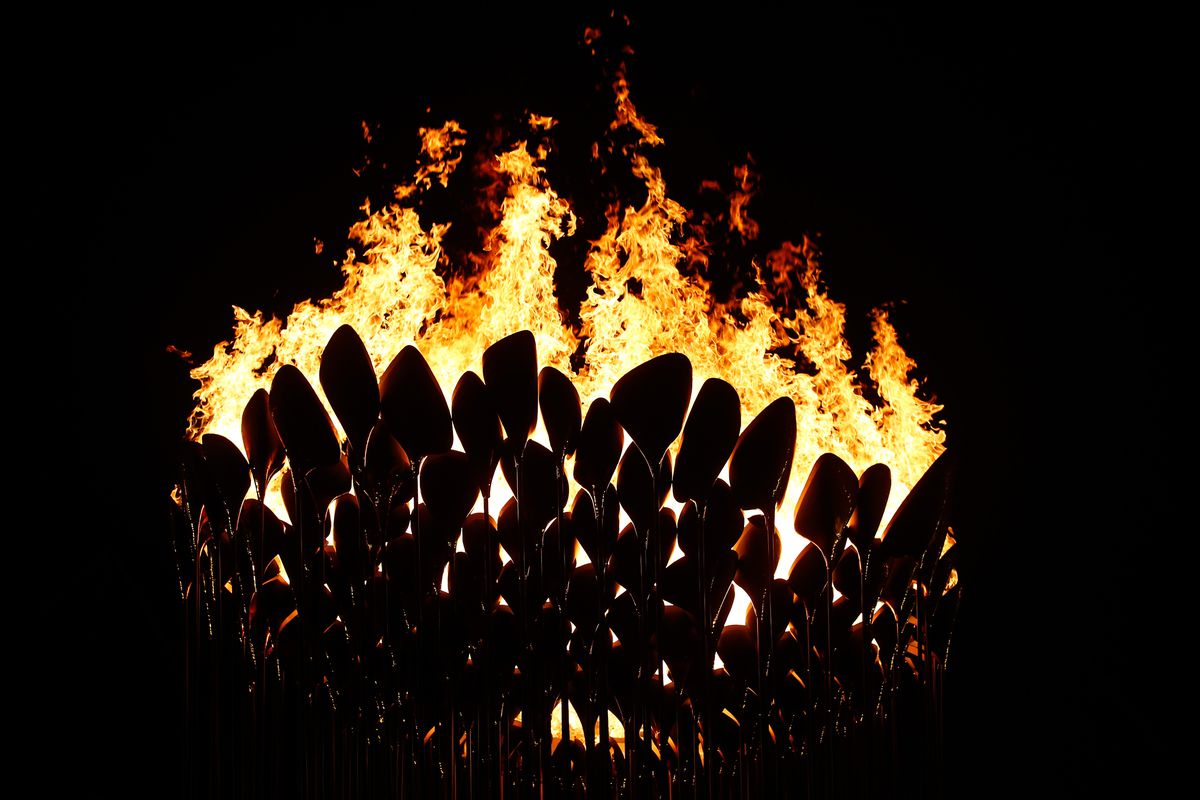 LONDON, ENGLAND - JULY 27:  The Olympic Cauldron is lit during the Opening Ceremony of the London 2012 Olympic Games at the Olympic Stadium on July 27, 2012 in London, England.  (Photo by Pool/Getty Images)