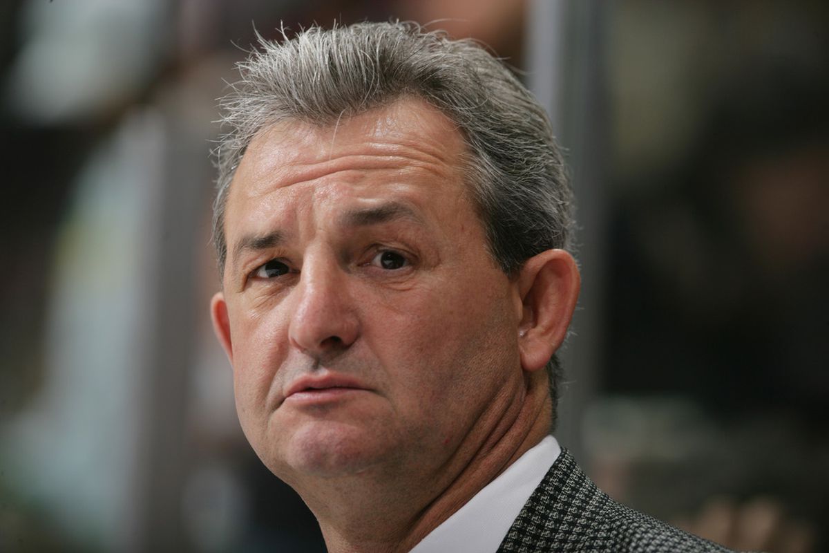 VANCOUVER - SEPTEMBER 30: Head Coach Darryl Sutter of the Calgary Flames looks on against the Vancouver Canucks during their pre-season NHL game at General Motors Place on September 30, 2005 in Vancouver, Canada. (Photo by Jeff Vinnick/Getty Images)