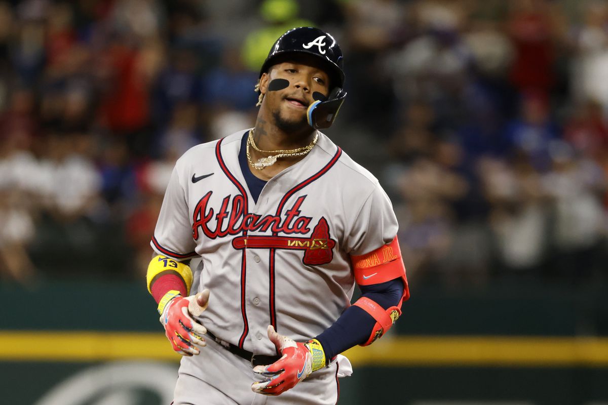 Ronald Acuna Jr. of the Atlanta Braves rounds the bases after hitting a two run home run against the Texas Rangers during the second inning at Globe Life Field on May 15, 2023 in Arlington, Texas.