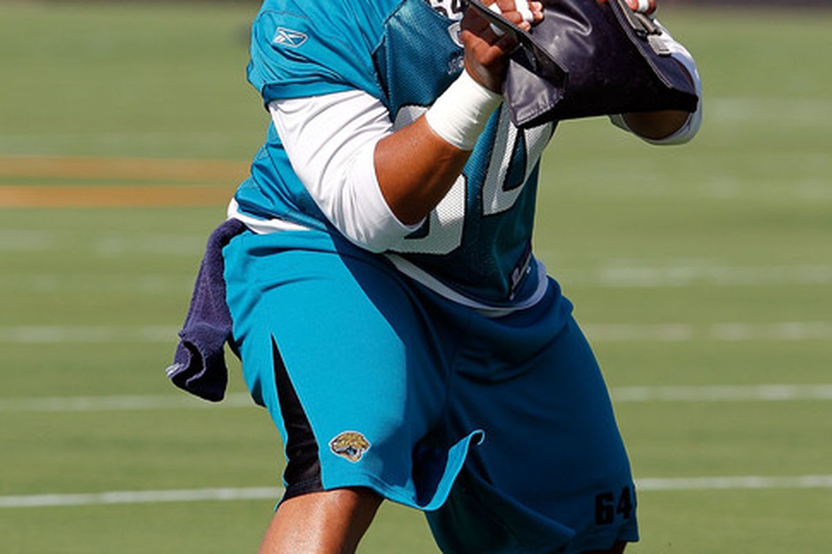 JACKSONVILLE FL - JULY 30:  Cecil Newton #64 of the Jacksonville Jaguars during the first day of Training Camp at EverBank Field on July 30 2010 in Jacksonville Florida.  (Photo by Sam Greenwood/Getty Images)