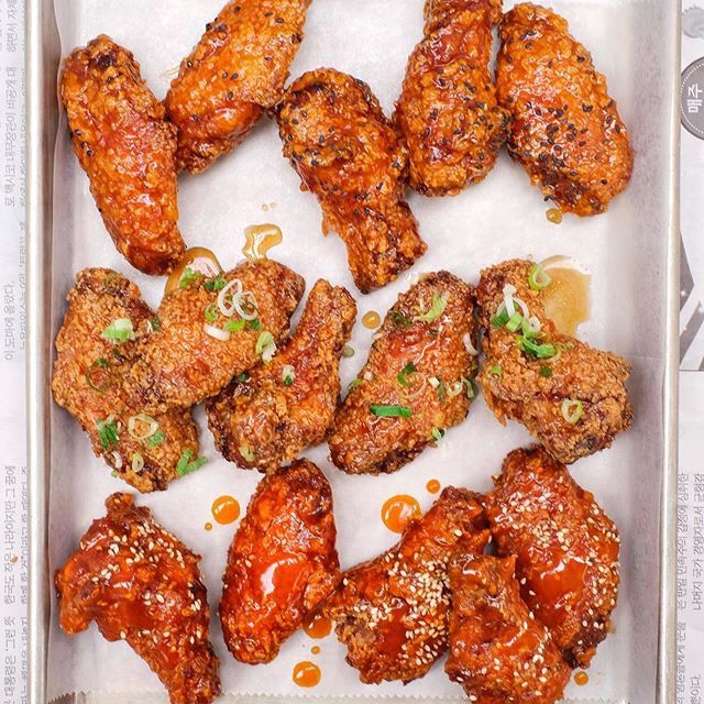 A tray of sauced chicken wings.