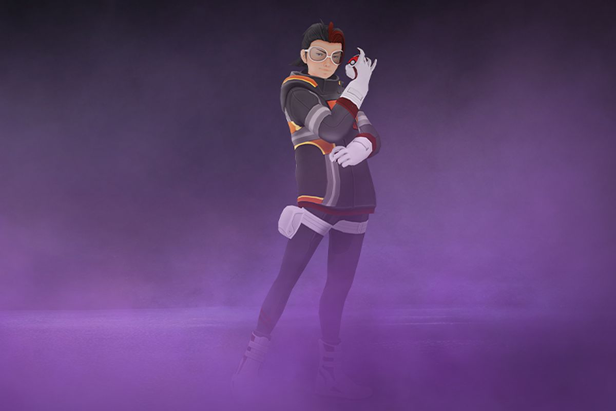 Team Rocket leader Arlo stands in purple fog, readying to battle