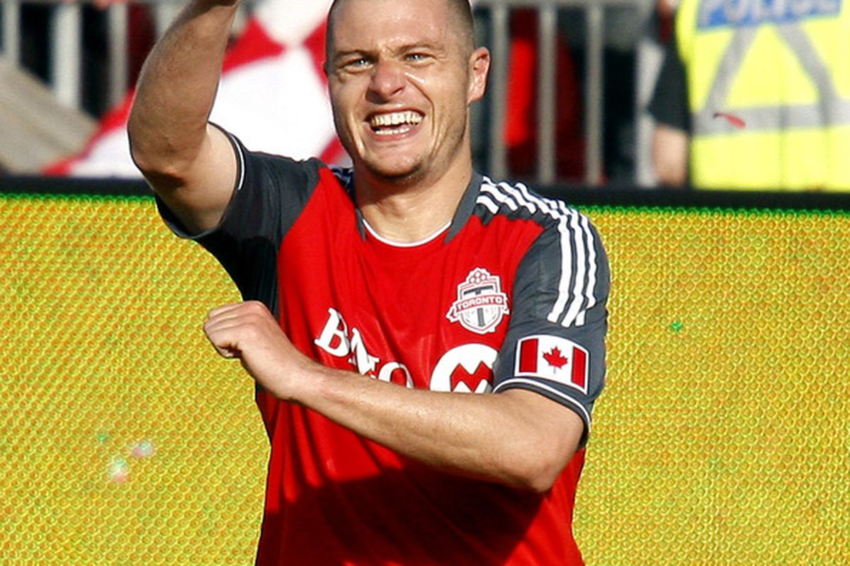TORONTO, CANADA - MAY 26: Danny Koevermans #14 of Toronto FC celebrates his goal against the Philadelphia Union during MLS action at BMO Field May 26, 2012 in Toronto, Ontario, Canada.  (Photo by Abelimages/Getty Images)