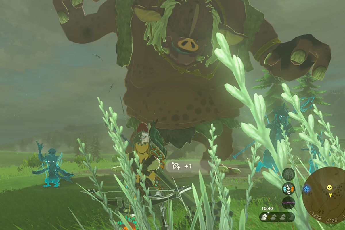 Link runs away from a Hinox in Zelda Tears of the Kingdom.