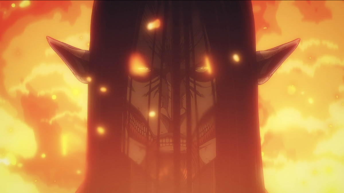 A shot of an Eren Titan walking past fire