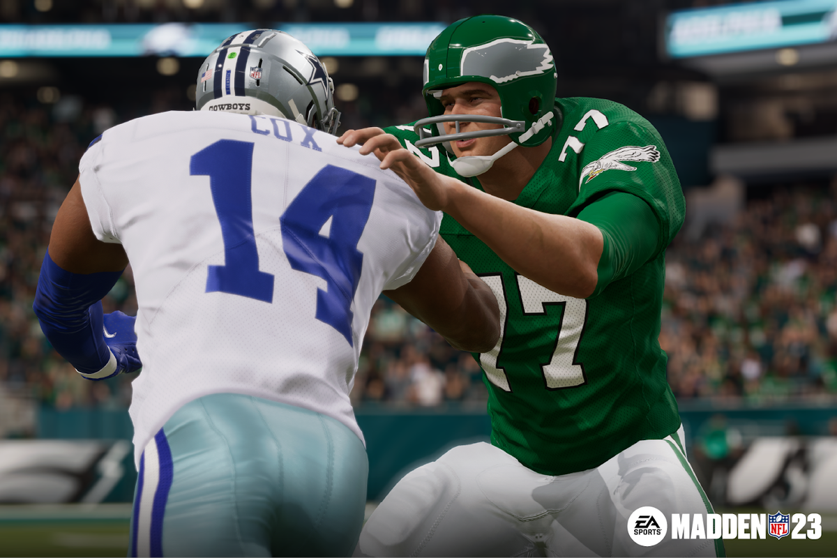 John Madden, wearing #77 for the Philadelphia Eagles, blocking the Dallas Cowboys’ Jabril Cox in Madden NFL 23.