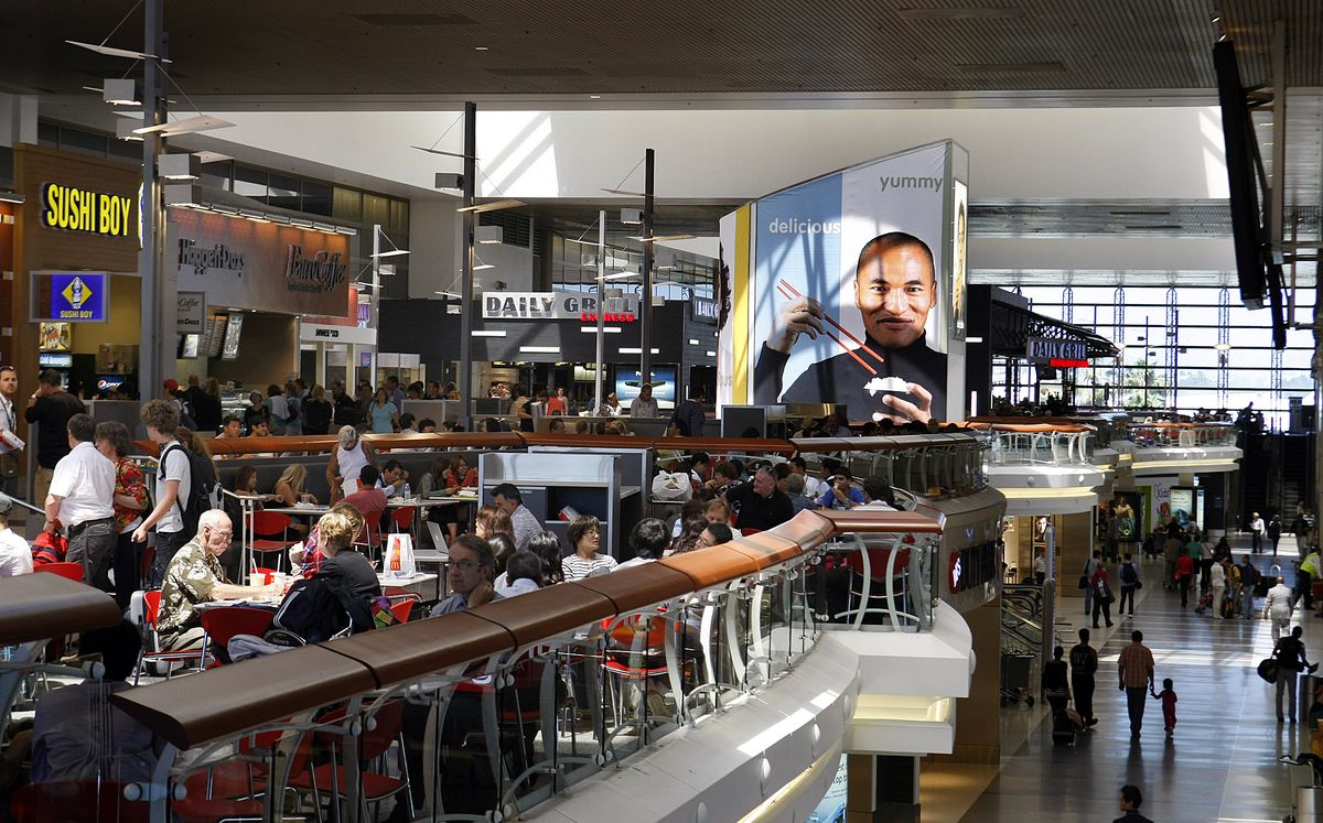 Travelers dine in the recently rebuilt restaurants and foodcourt at the Tom Bradley International T