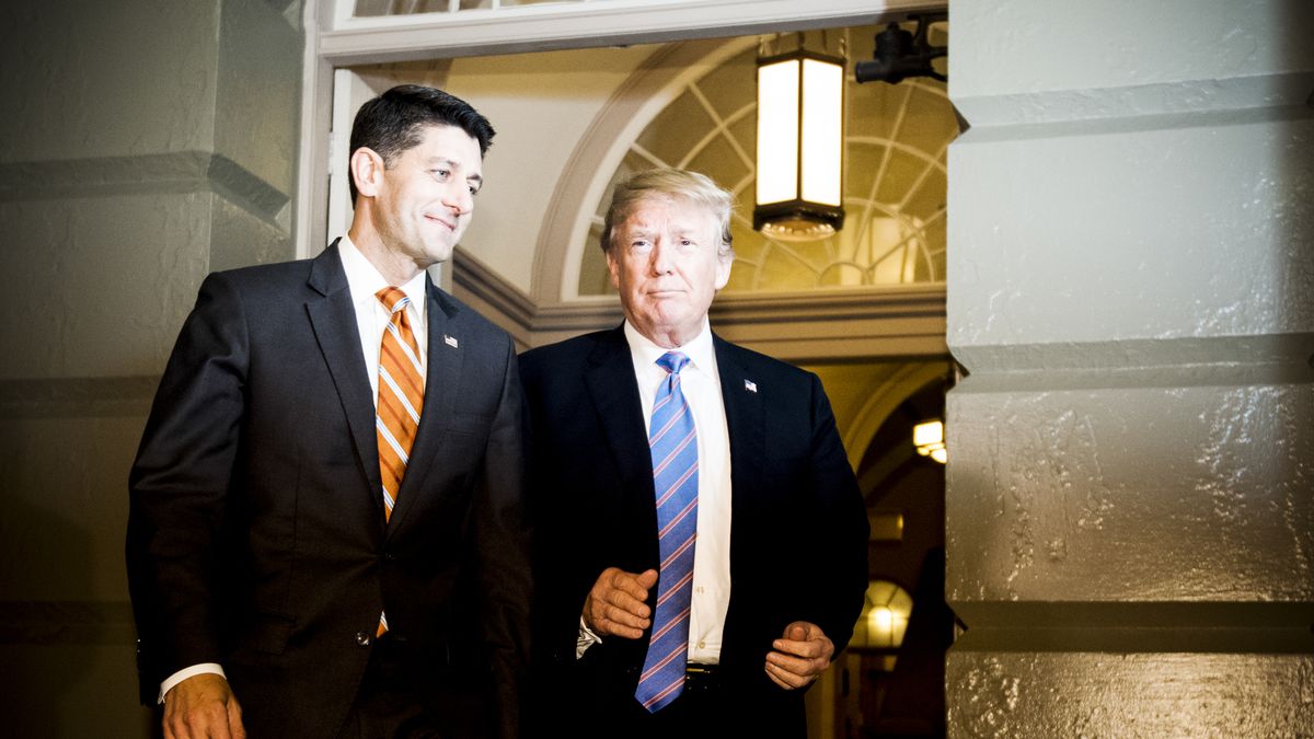Speaker of the House Paul Ryan (R-WI) escorts President Trump to the House Republican caucus meeting in the basement of the Capitol on June 19, 2018.