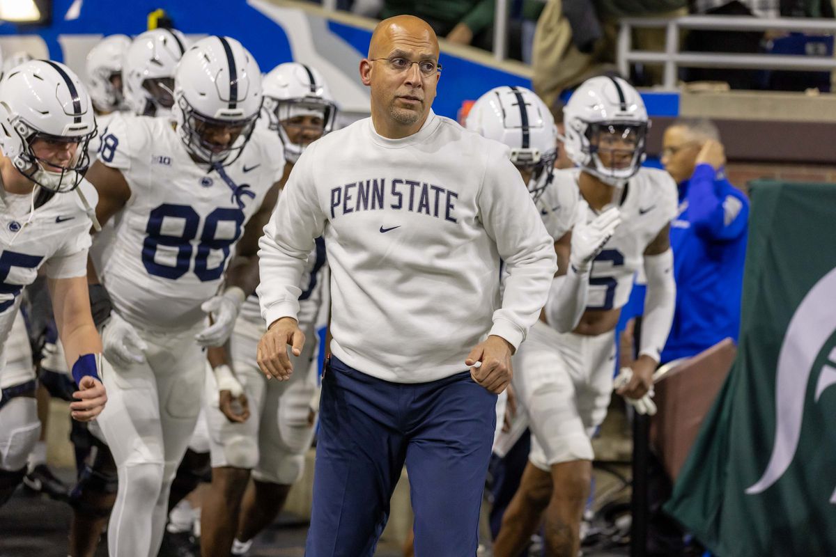 Penn State Nittany Lions head coach James Franklin leads his team to the field to start the second half against the Michigan State Spartans at Ford Field.