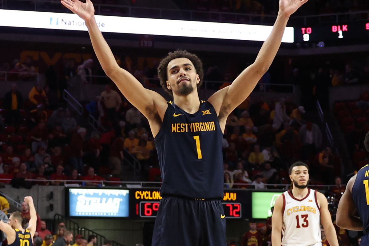 West Virginia Mountaineers forward Emmitt Matthews Jr. celebrates after their win over the Iowa State Cyclones at James H. Hilton Coliseum.