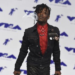 Lil Uzi Vert arrives at the MTV Video Music Awards at The Forum on Sunday, Aug. 27, 2017, in Inglewood, Calif.