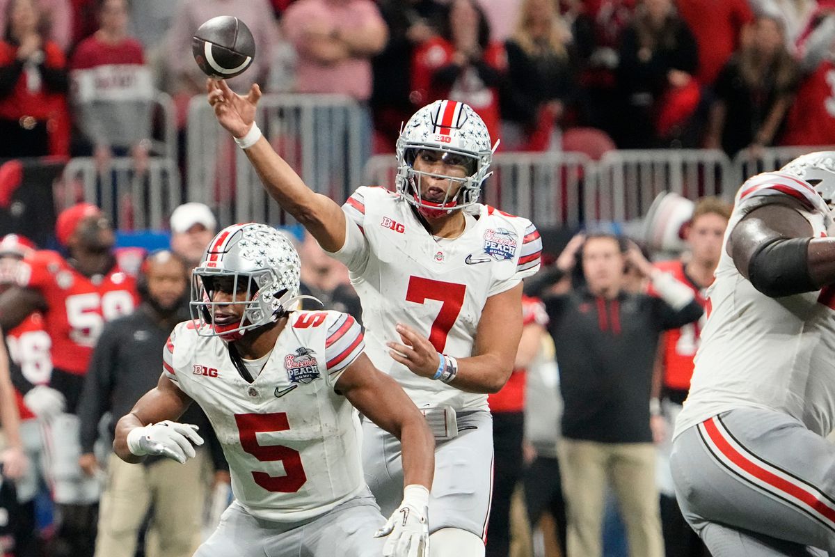 Ohio State Buckeyes quarterback C.J. Stroud (7) throws a pass during the second half of the Peach Bowl in the College Football Playoff semifinal at Mercedes-Benz Stadium. Ohio State lost 42-41.