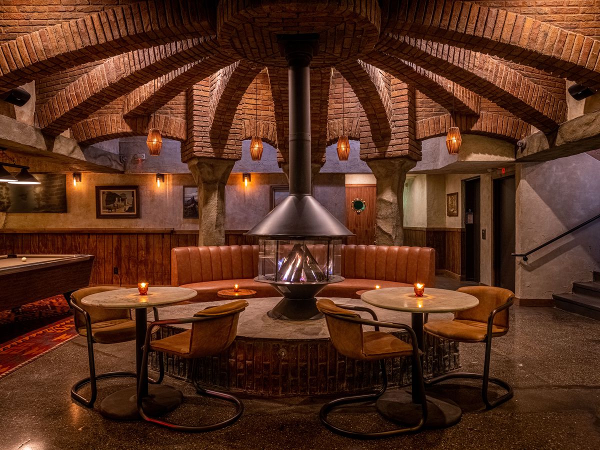 Circular fireplace at the High Low bar in Los Angeles, California