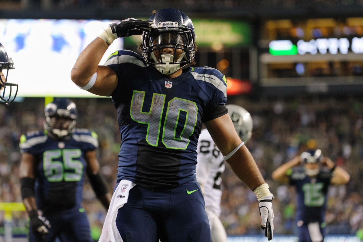 Aug 30, 2012; Seattle, WA, USA; Seattle Seahawks running back Vai Taua (40) salutes the fans after running in a touchdown against the Oakland Raiders during the 1st half at CenturyLink Field. Mandatory Credit: Steven Bisig-US PRESSWIRE