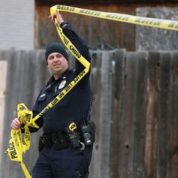 Sandy City police work at the scene of a shooting in Sandy on Thursday, Dec. 18, 2014. 