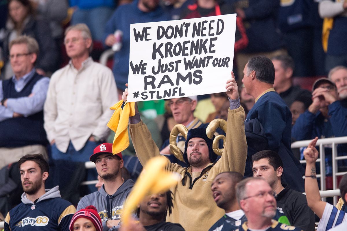 Maybe the Rams thought this fan's sign read "We Just Want our Rams hats and jerseys" - MAK - Photo by