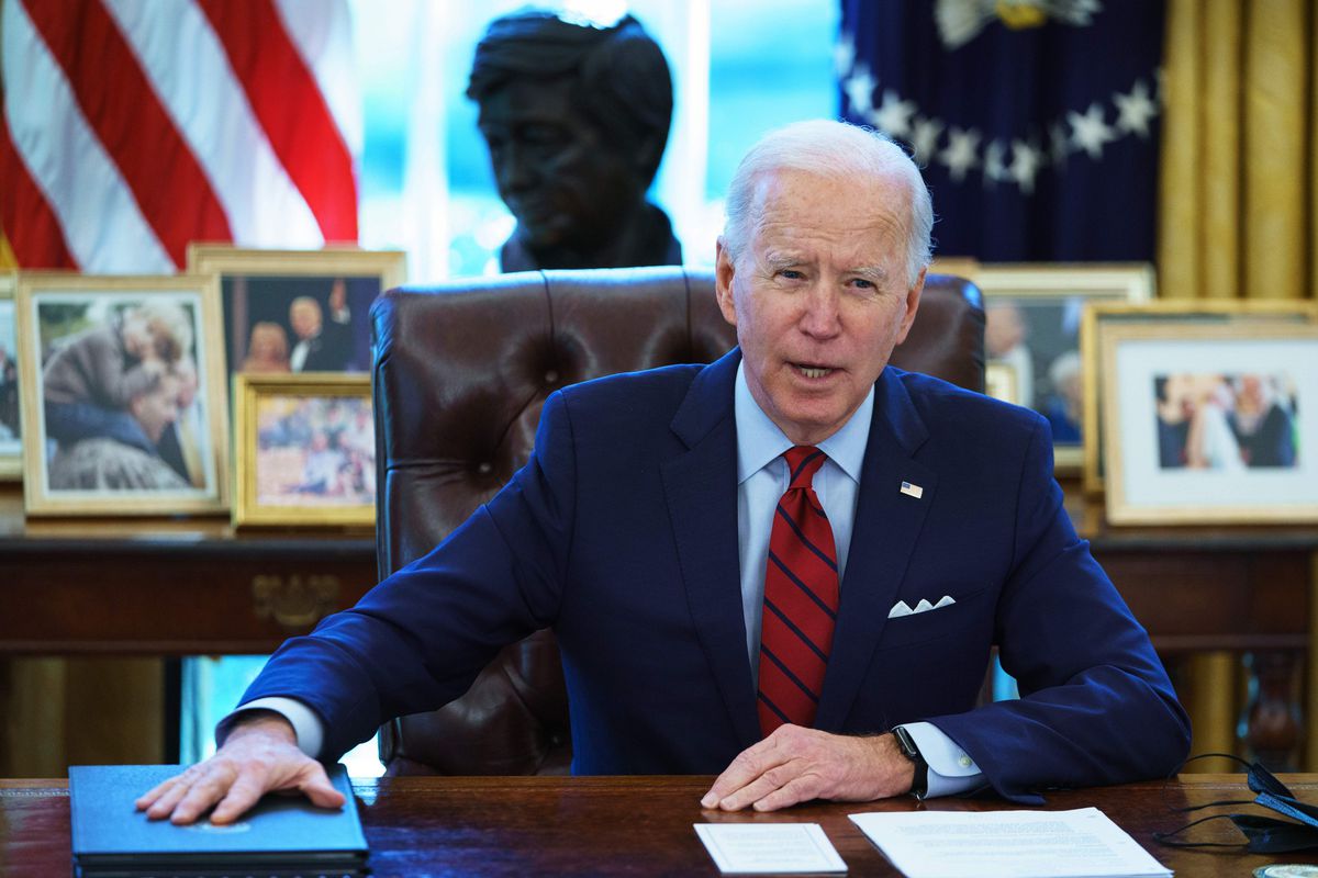 President Joe Biden speaks at the Oval Office in the White House on January 28, 2021.