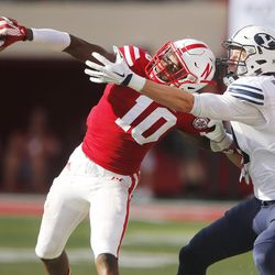 Brigham Young Cougars wide receiver Mitch Mathews (10) has the ball deflected by Nebraska Cornhuskers defensive back Joshua Kalu (10) against Nebraska in Lincoln Saturday, Sept. 5, 2015. BYU won 33-28 on a last-second touchdown pass. 