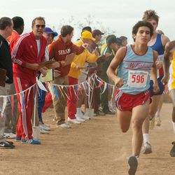 Kevin Costner, third from left, and Hector Duran, foreground right, appear in a scene from "McFarland, USA."