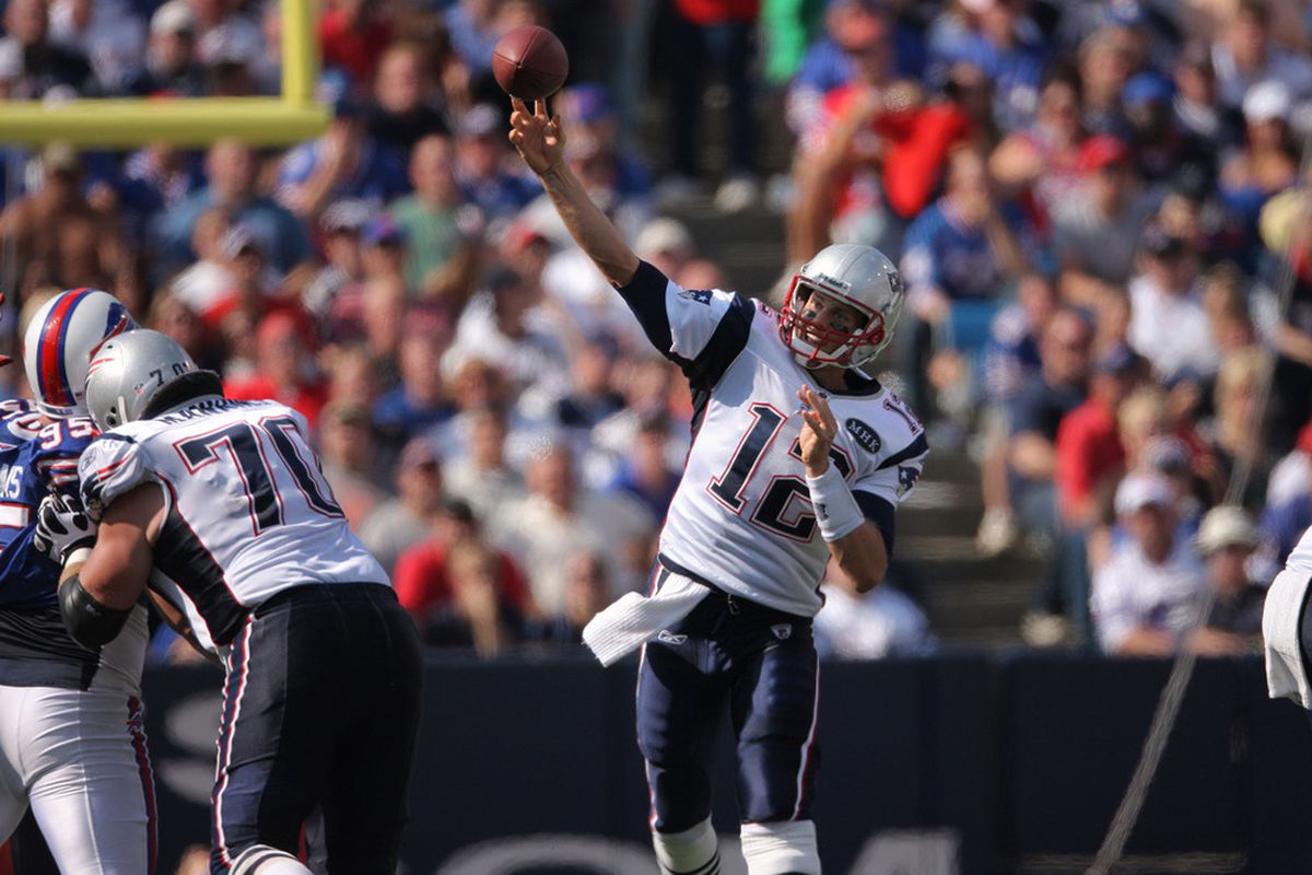 ORCHARD PARK, NY - SEPTEMBER 25: Tom Brady #12 of the New England Patriots throws in NFL game against the Buffalo Bills at Ralph Wilson Stadium on September 25, 2011 in Orchard Park, New York. (Photo by Tom Szczerbowski/Getty Images)