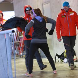 Some coaches catch Kate Hansen dancing to warm up before her second run in the women's race of the luge World Cup at the Utah Olympic Park in Park City on Friday, Dec. 13, 2013. Hansen placed fourth.
