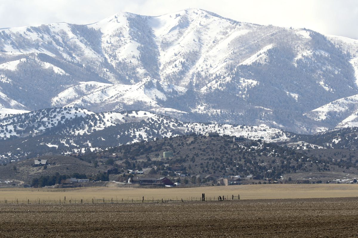 Land between 6300 West and 8500 West and 12400 South and 13100 South in unincorporated Salt Lake County, foreground, is pictured on Monday, March 11, 2019. 