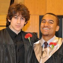 In this undated photo provided by Robin Young, Dzhokhar A. Tsarnaev, left, and Here & Now host Robin Young’s nephew, right, pose for a photo after graduating from Cambridge Rindge and Latin High School. 