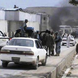 This image made from AP video shows the scene moments after a car bomb exploded in front the PRT, Provincial Reconstruction Team, in Qalat, Zabul province, southern Afghanistan, Saturday, April 6, 2013. Six American troops and civilians and an Afghan doctor were killed in attacks on Saturday in southern and eastern Afghanistan as the U.S. military's top officer began a weekend visit to the country, officials said.(AP Photo via AP video)