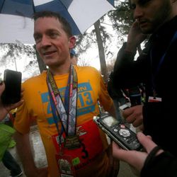 Bryant Jensen talks to the media after winning the Salt Lake City Marathon in Salt Lake City on Saturday, April 20, 2013.