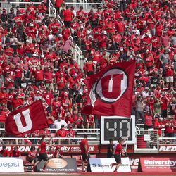 Utah fans celebrate a touchdown during first half action in the University of Utah versus Northern Illinois football game at Rice-Eccles Stadium in Salt Lake City on Saturday, Sept. 7, 2019.