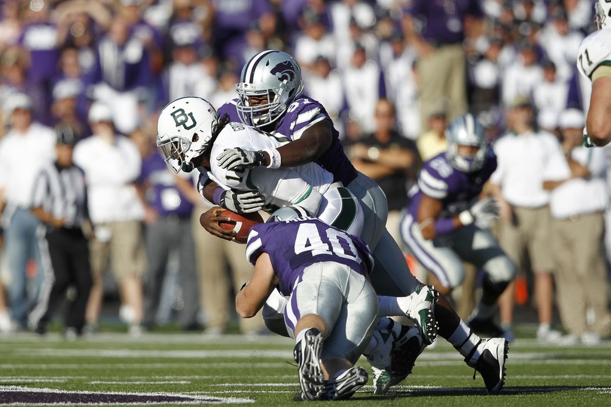 As Robert Griffin III will attest, both Adam Davis and Ryan Mueller (40) can pack quite a punch. Both players will be key cogs in K-State's defensive line rotation in 2012, with Mueller expected to be a key reserve at defensive end.