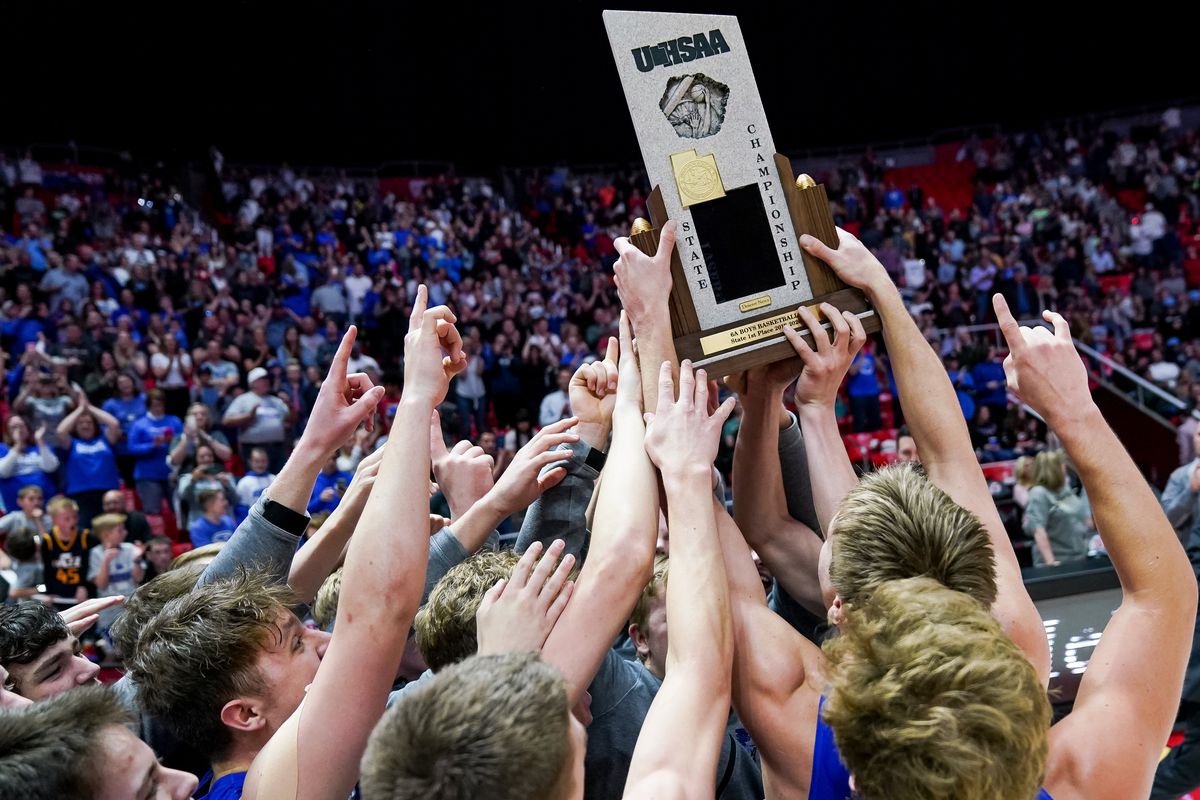 Fremont celebrates its win over Davis in the 6A boys basketball championship game at the Huntsman Center in Salt Lake City on Saturday, Feb. 29, 2020.