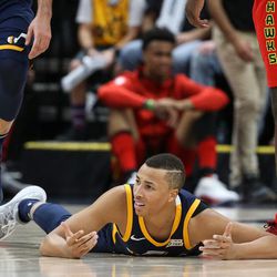 Utah Jazz guard Dante Exum (11) reacts after being charged with a foul during the game against the Atlanta Hawks at Vivint Smart Home Arena in Salt Lake City on Tuesday, March 20, 2018.