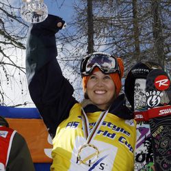 In this March 12, 2008, file photo, Sarah Burke, of Canada, celebrates on the podium after winning the women\'s halfpipe freestyle title at the World Cup finals in Valmalenco, Italy. Burke died Thursday, Jan. 19, 2012, nine days after crashing at the bottom of the superpipe during a training run in Utah.