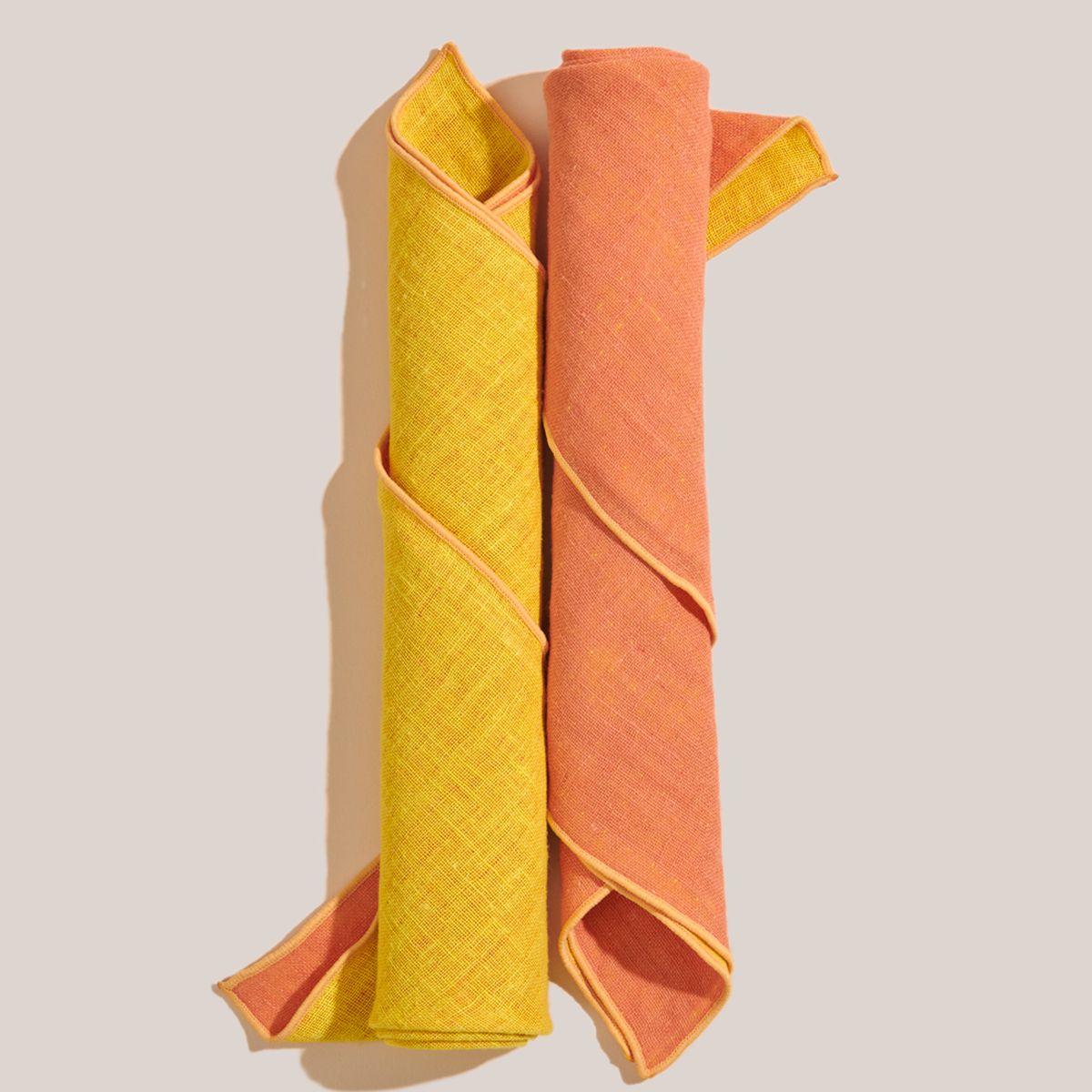 Two rolled napkins