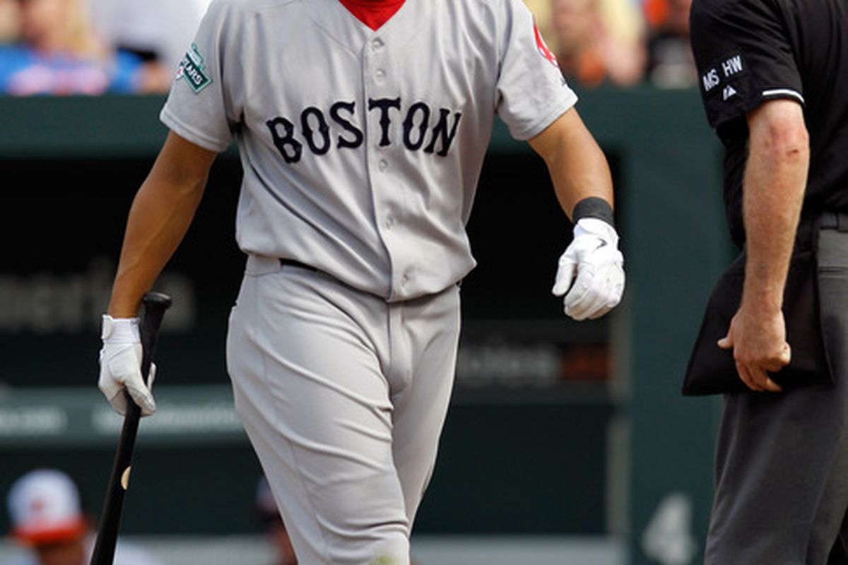 This man has no business in a Red Sox uniform. I'm glad this man is in a Red Sox uniform.